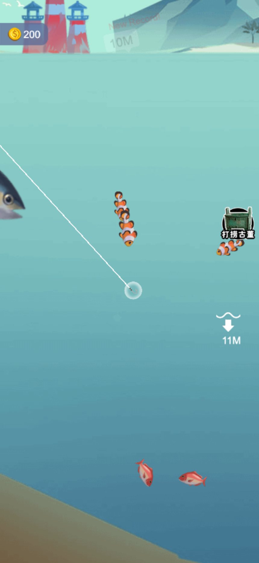 Fishing line sinking past clownfish